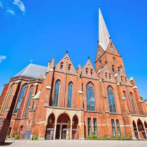 Explore Hamburg at your own speed with hop-on hop-off bus tours – Panoramic views, audio guides, and unlimited stops in 2026